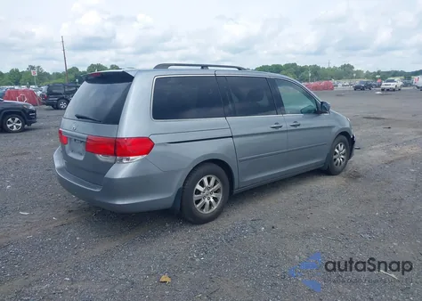 2010 Honda Odyssey Ex-L z USA, uszkodzony, nr VIN 5FNRL3H64AB107077